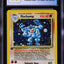 1999 POKEMON BASE SET 2-PLAYER CD STARTER 1ST EDITION COSMOS HOLO MACHAMP #8 CGC 10 PRISTINE